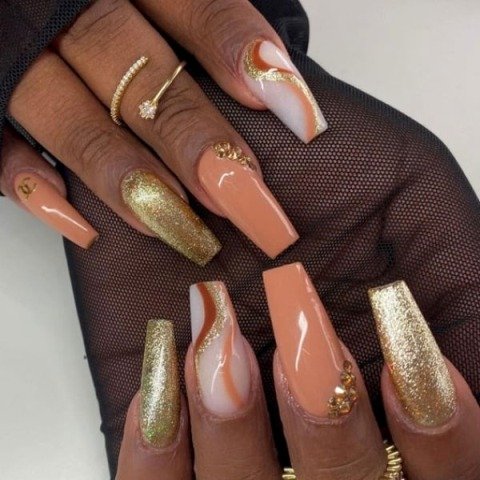 Marvellous-Gold,-Orange,-and-White-Nail-Design